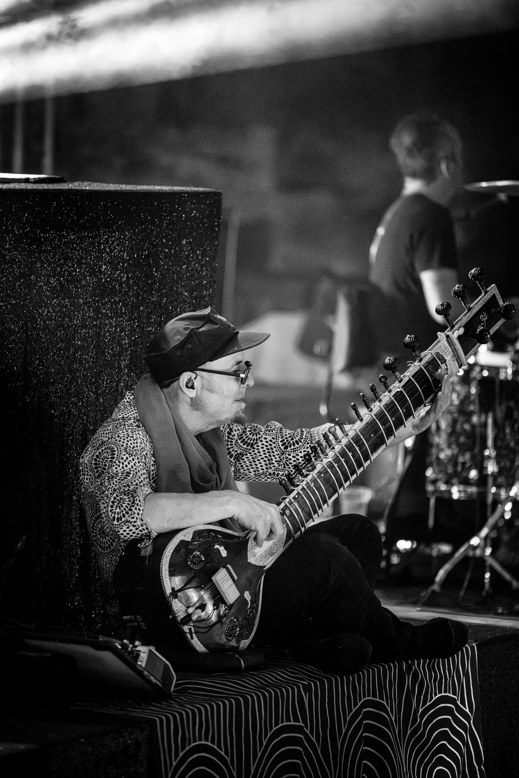 Rob Myers playing sitar with Thievery Corporation at Moni Lazariston in Thessaloniki.
