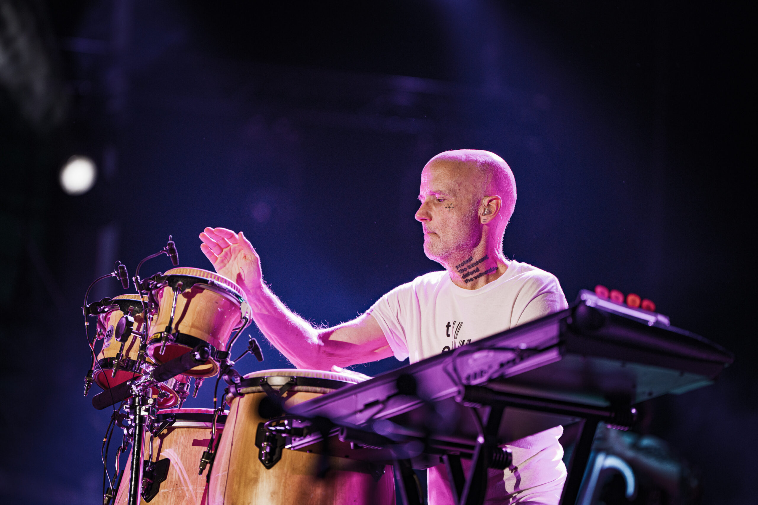 Moby playing bongos during his live performance at Release Athens Festival, Athens