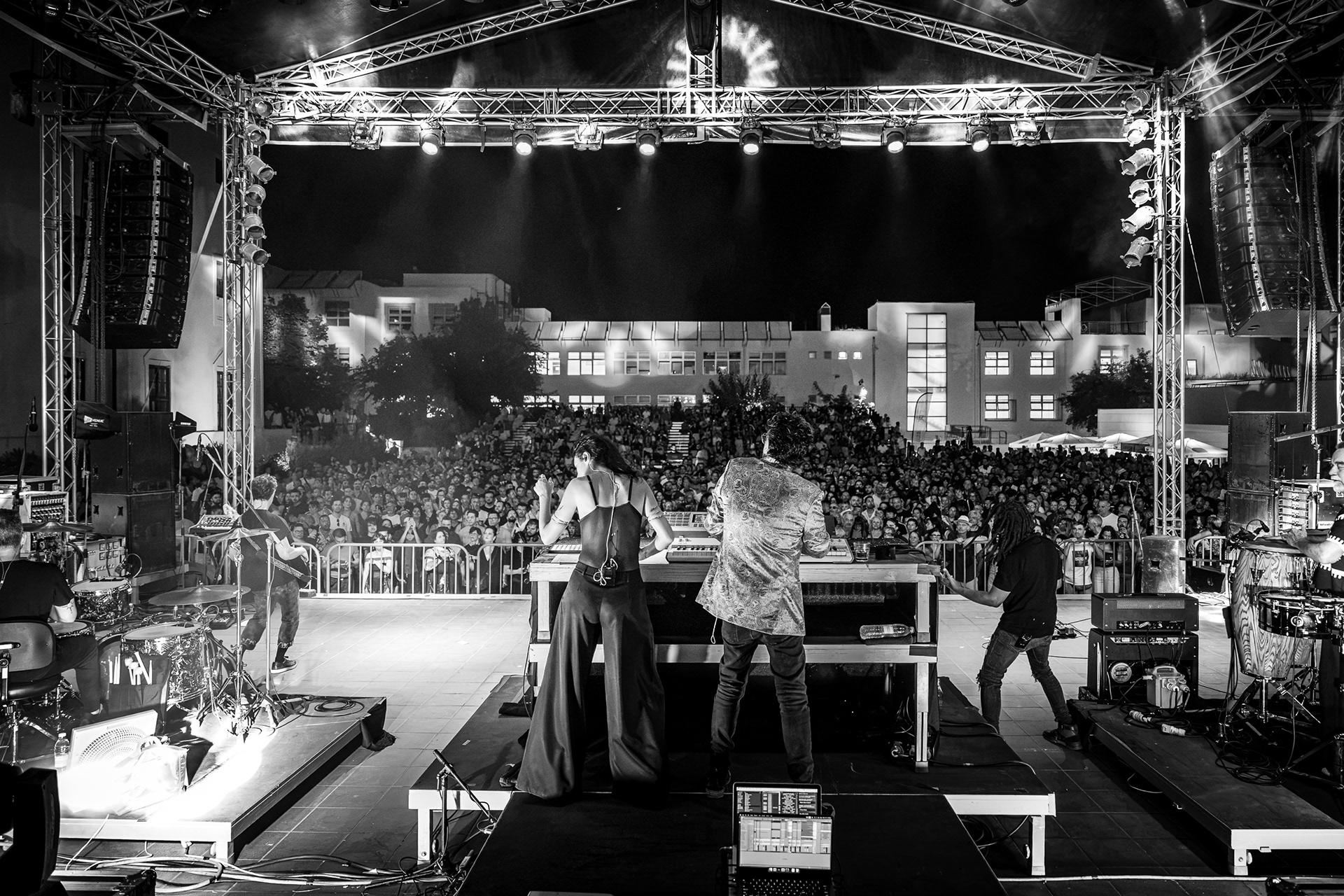 Live performance and audience at an outdoor concert