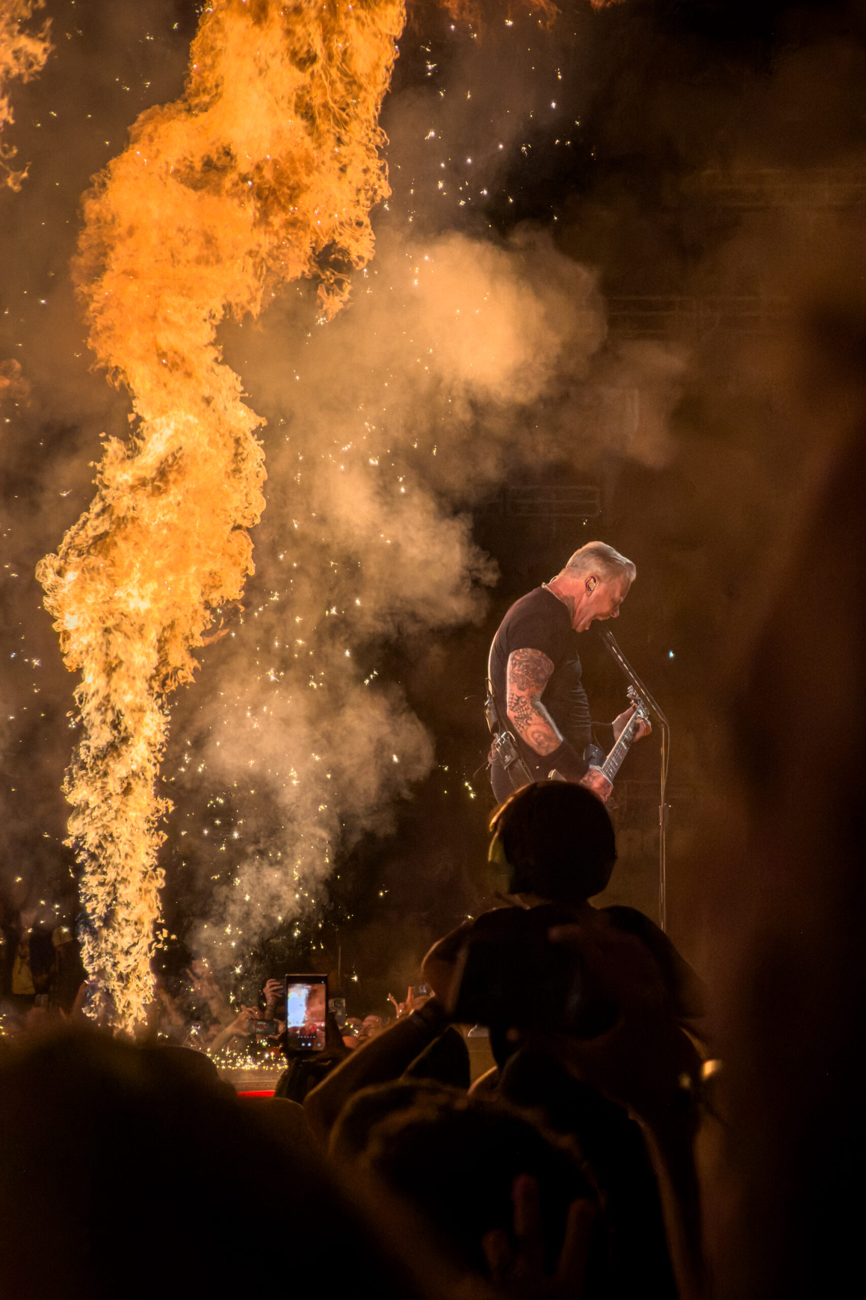 James Hetfield performing with Metallica surrounded by flames during the M72 World Tour at OAKA Stadium in Athens, Greece