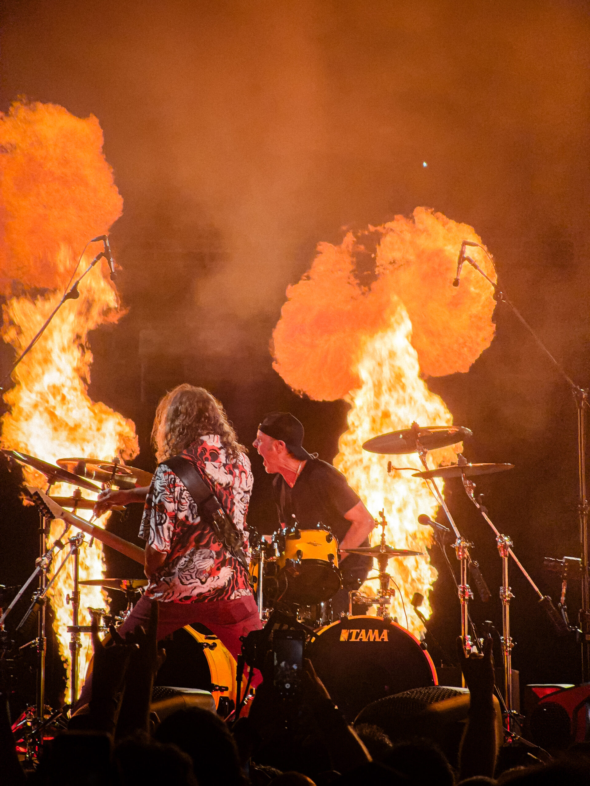 Metallica performing with towering flames during the M72 World Tour at OAKA Stadium in Athens, Greece.