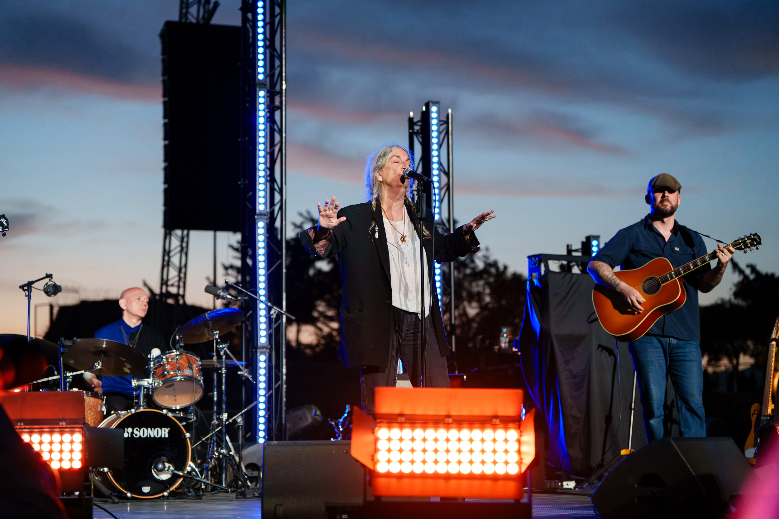 Patti Smith performing with Seb Rochford and Jackson Smith at Lycabettus Theater in Athens, 2026