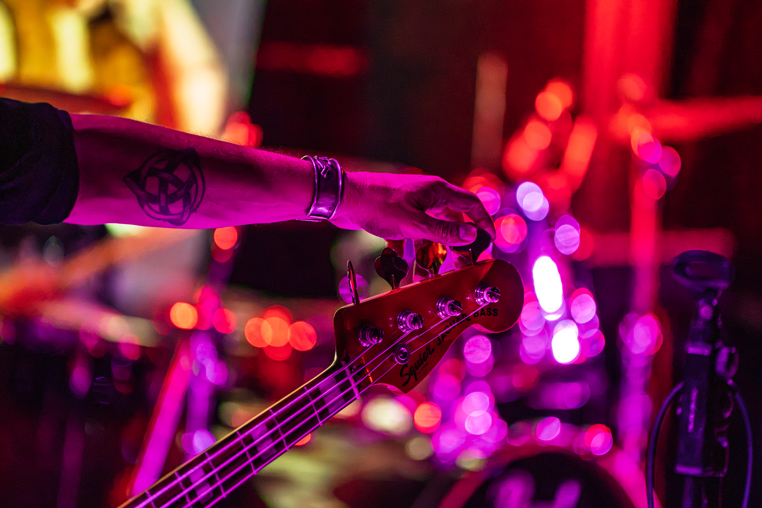 Close-up of Constantinos' bass guitar during a Secular Upheaval live performance at AN Club in Athens, 2026.