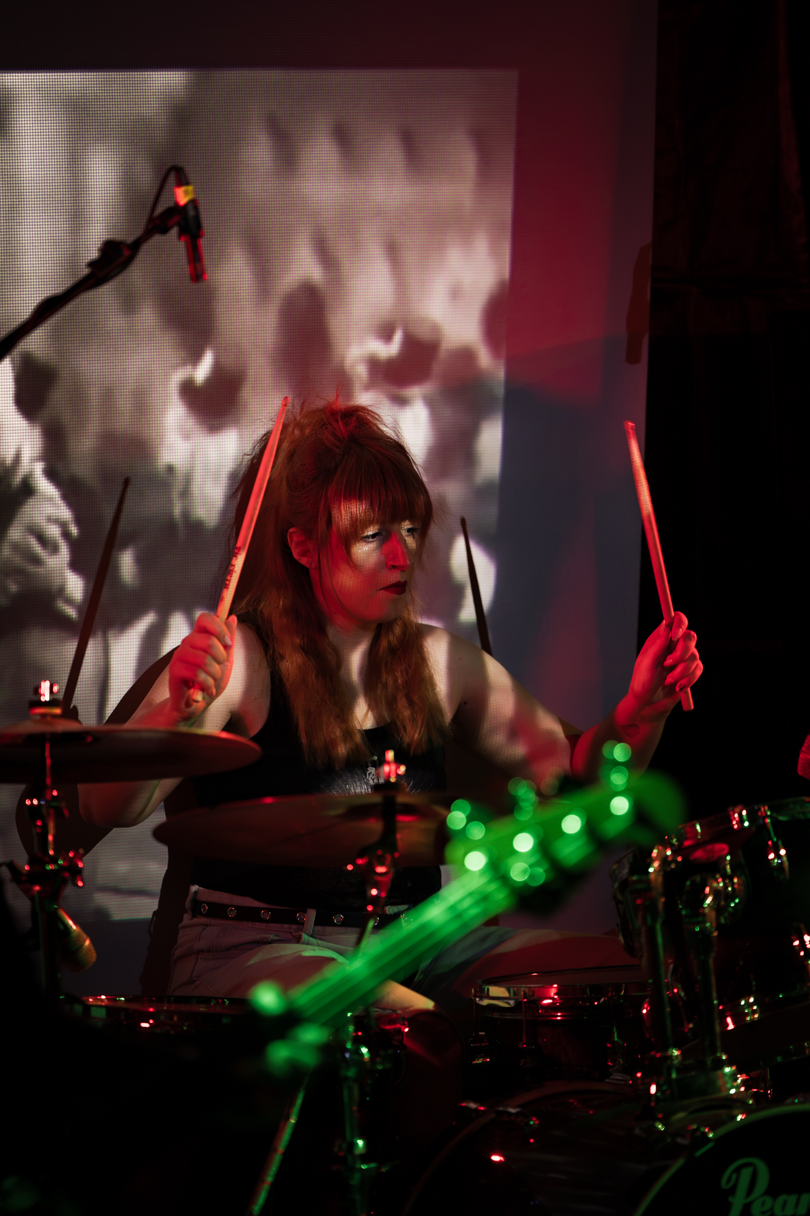 Dimitra performing on drums with Secular Upheaval during their live show at An Club in Athens, 2026
