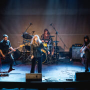 Secular Upheaval performing live at Architektoniki in Athens in 2025, featuring vocals, two bass guitars and drums.