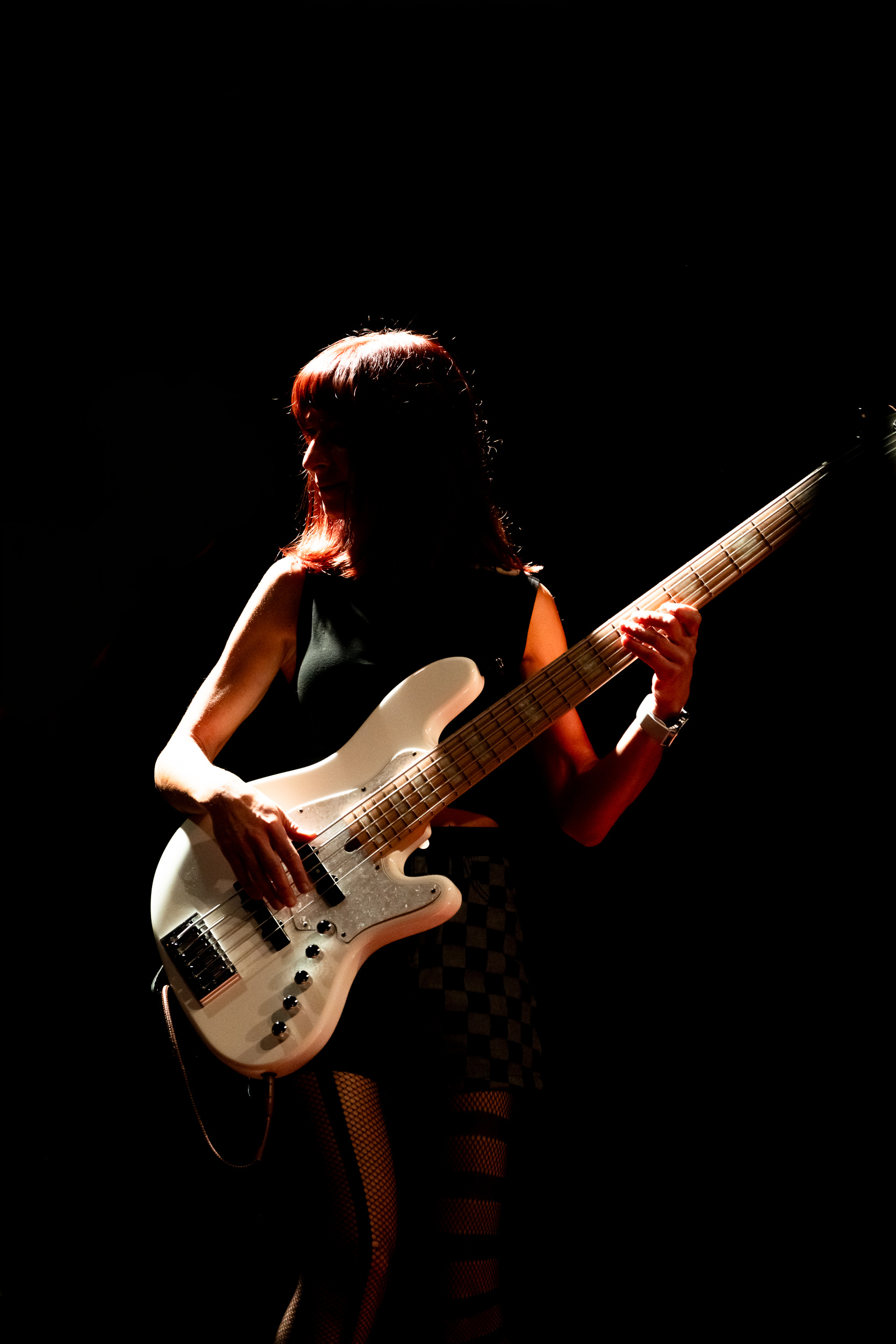 Dora performing bass with Secular Upheaval at Architecture Live Stage in Athens