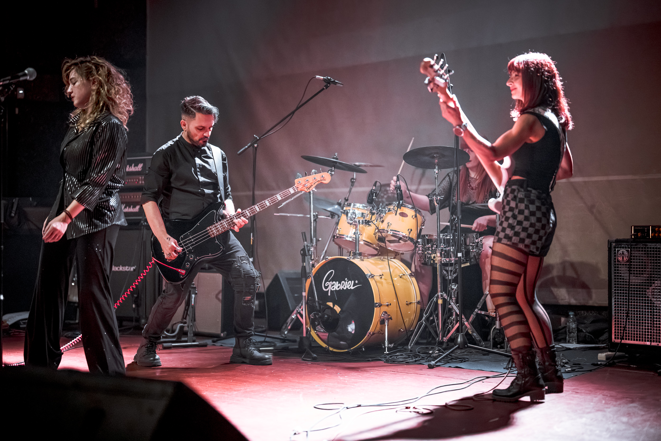 Secular Upheaval performing live at Architektoniki in Athens in 2025, featuring vocals, two bass guitars and drums.