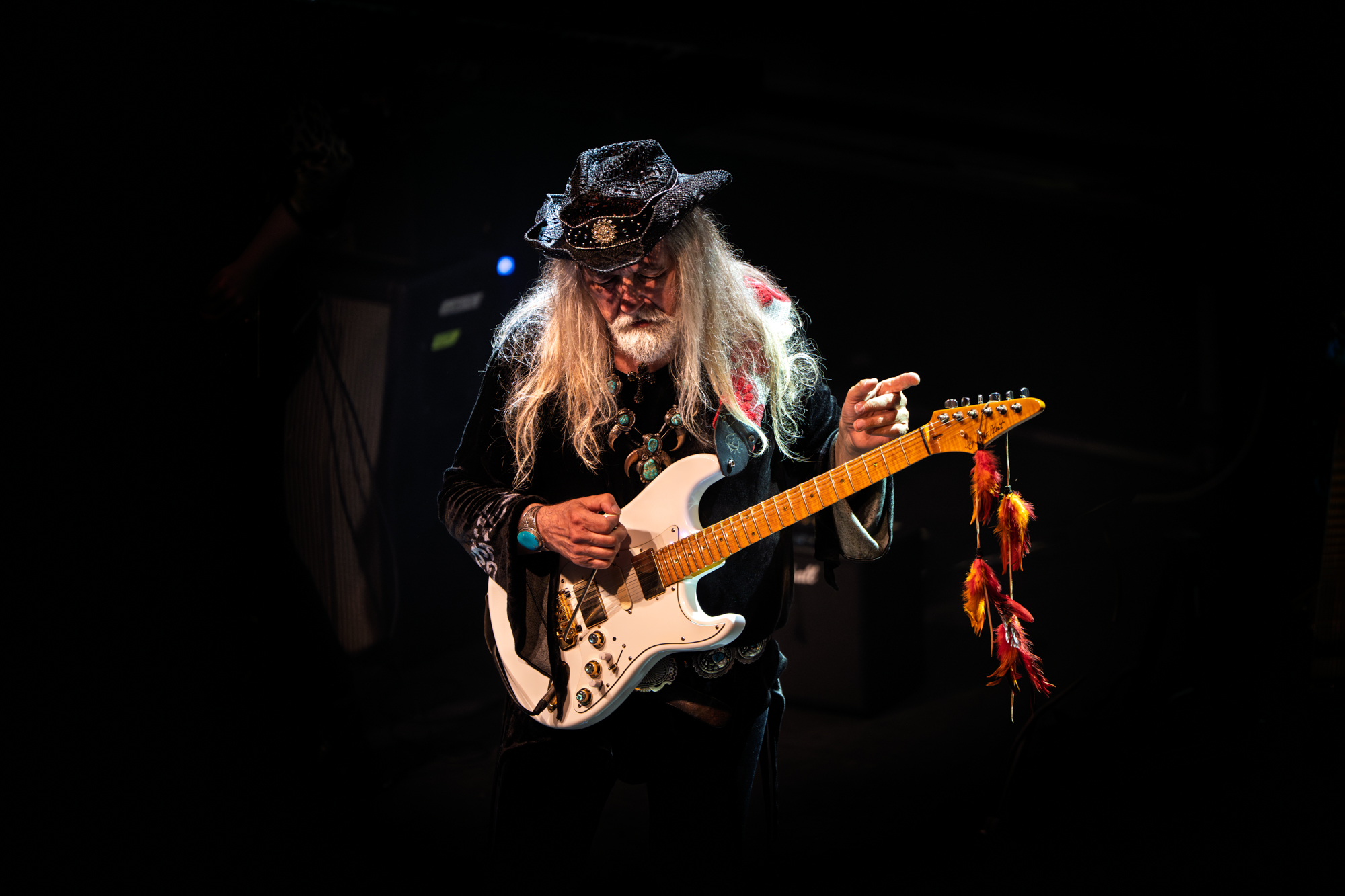 Uli Jon Roth pointing while performing with his Sky Guitar at Gagarin 205 in Athens